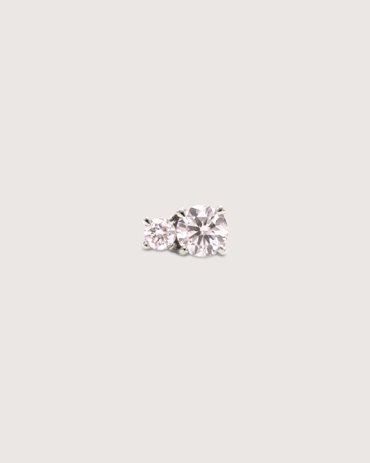 The Diamond Duo Stud earring in recycled solid 14K white gold, set with two lab-grown diamonds in prong settings.