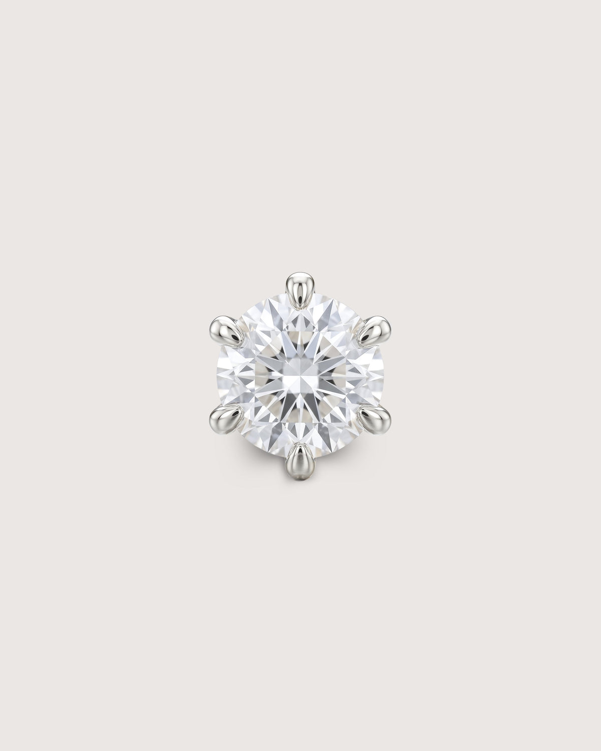 The Solitaire Diamond Stud in solid 14K recycled white gold, set with a 5mm brilliant-cut lab-grown diamond.