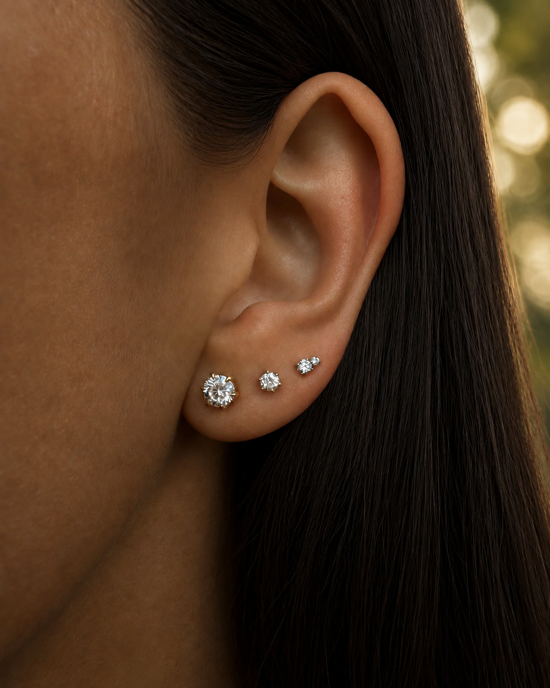 The Solitaire Diamond Stud in a refined 6-prong setting, recycled 14K gold.