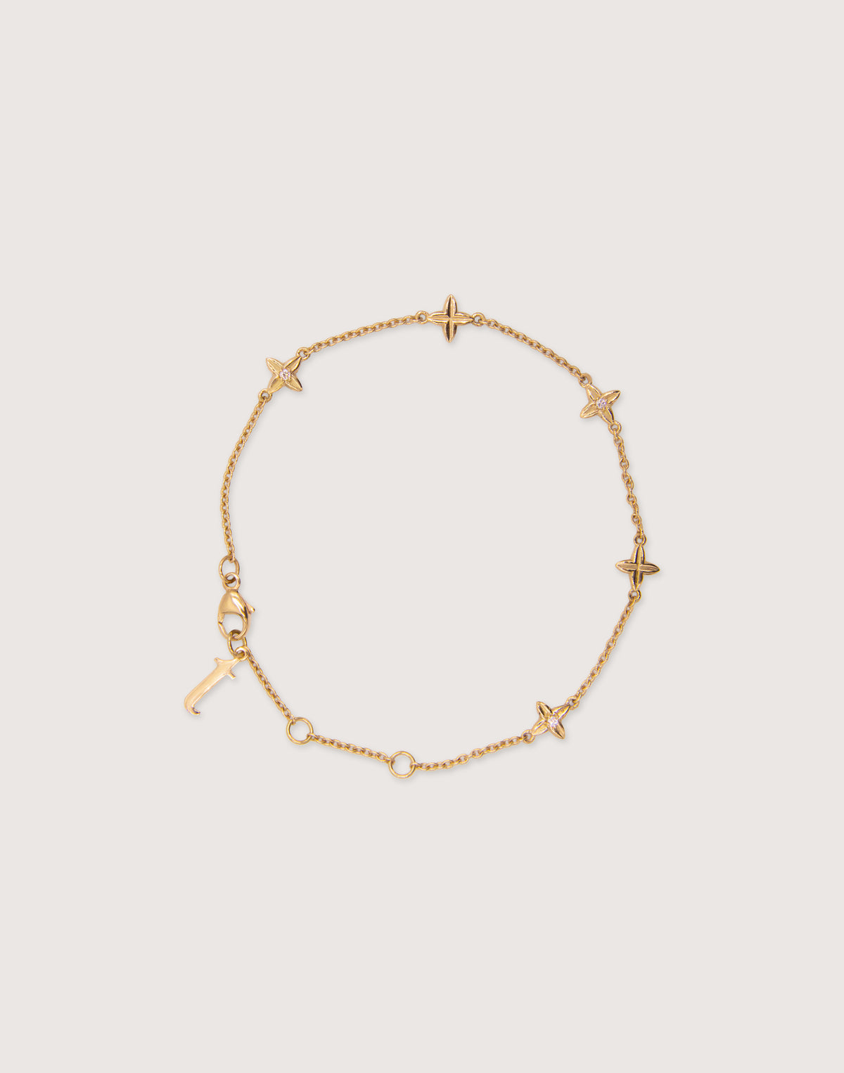 The Flora Station Bracelet in recycled 18K gold, worn on the wrist.