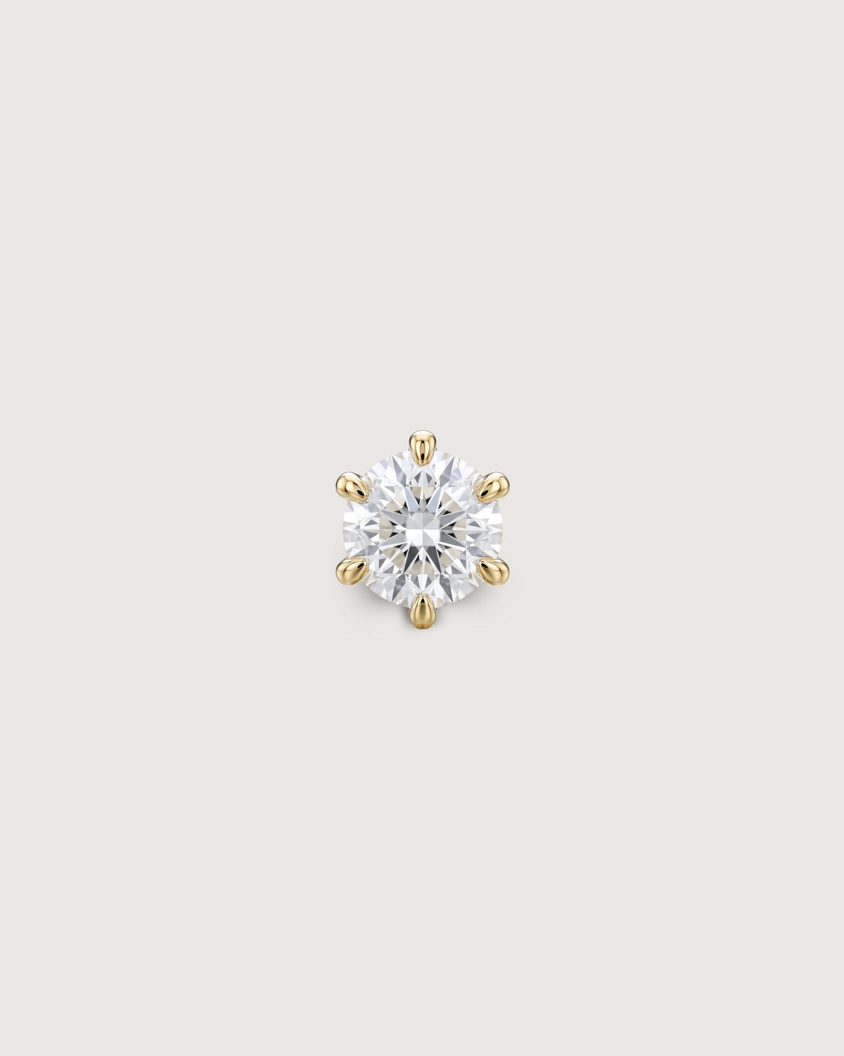 The Petite Solitaire Diamond Stud in solid 14K recycled gold, set with a 3mm brilliant-cut lab-grown diamond.