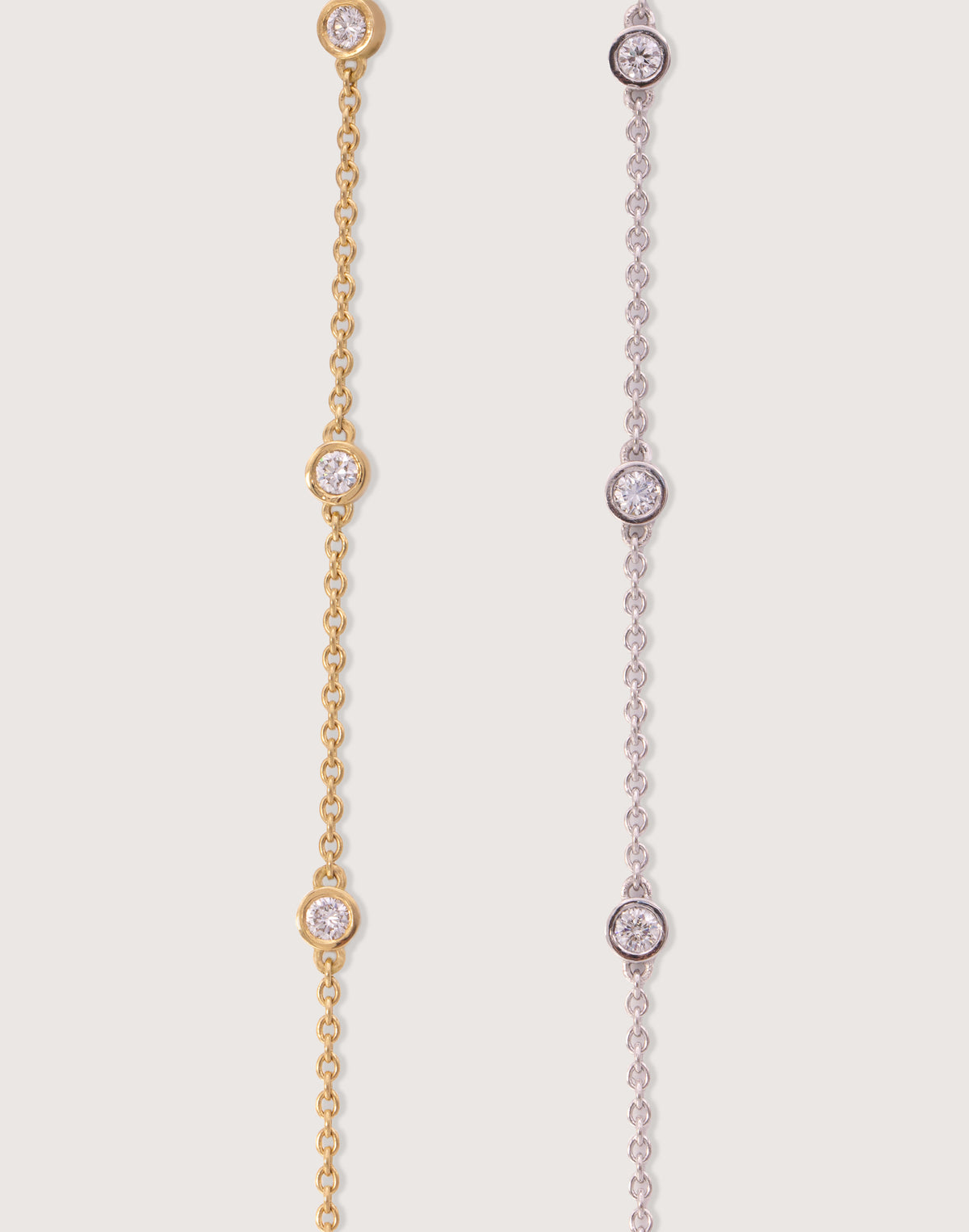 The Bezel Diamond Station Bracelet family, recycled 18K gold and white gold.