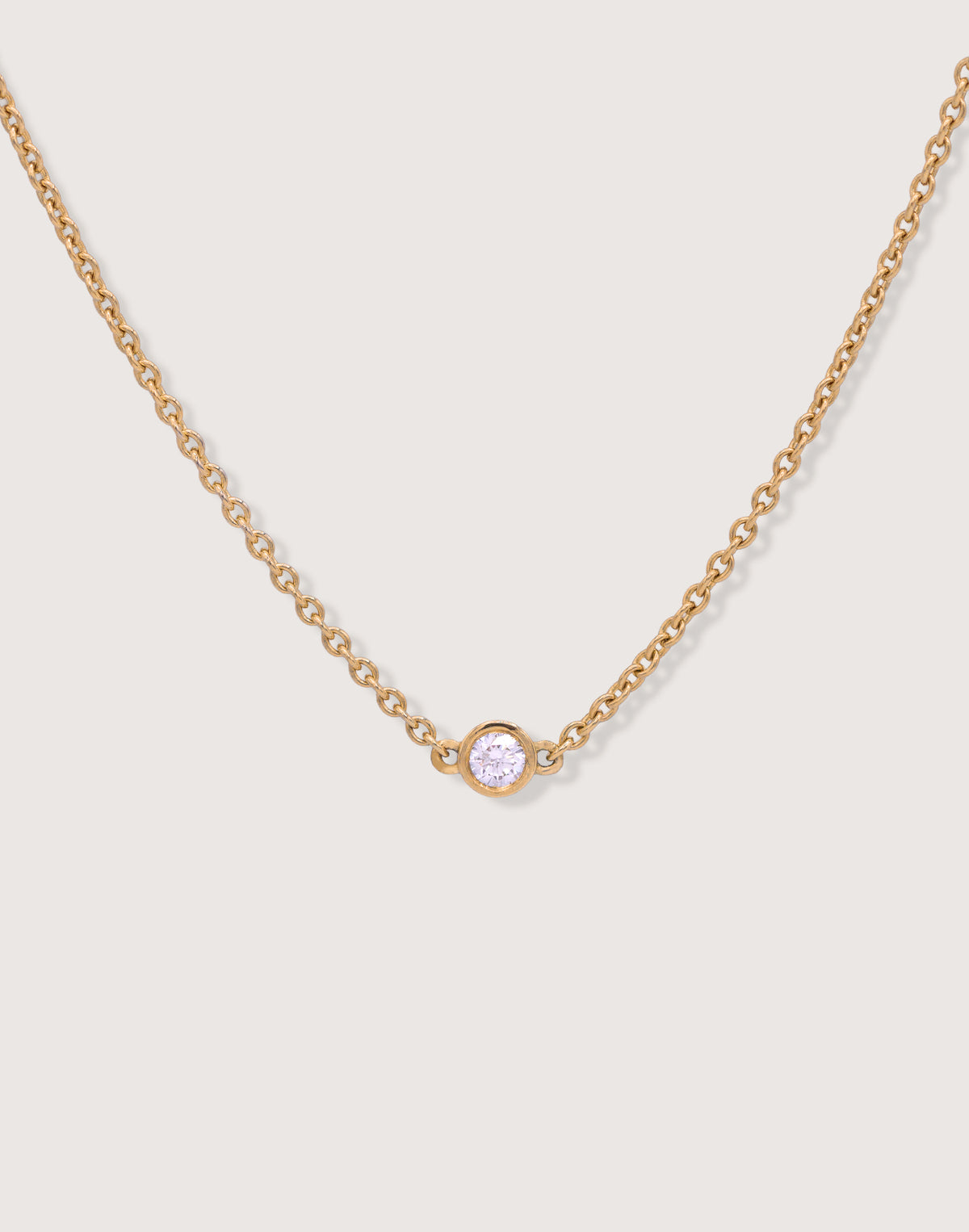 The Bezel Diamond Necklace in recycled solid 18K gold, centered on a 3mm bezel-set lab-grown diamond.