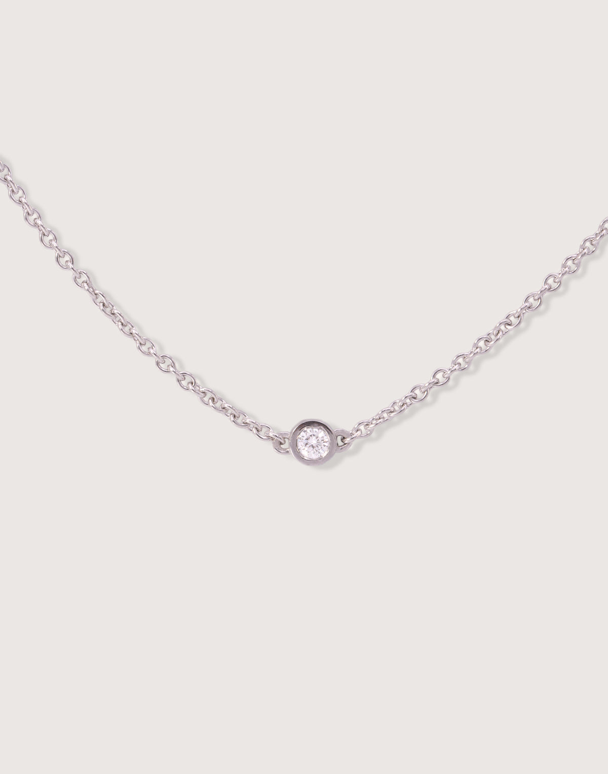 The Bezel Diamond Necklace in recycled solid 18K white gold, centered on a 3mm bezel-set lab-grown diamond.